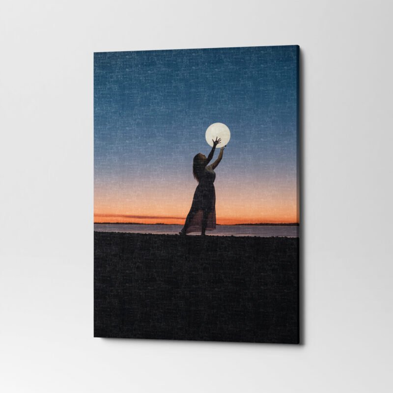 A Girl Holding Moon at Seaside Canvas Wall Art - Image 3