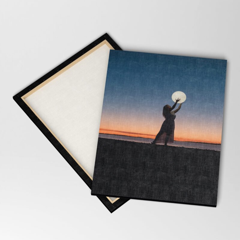 A Girl Holding Moon at Seaside Canvas Wall Art - Image 4